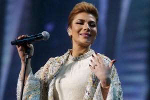 Syrian singer Assala Nasri performs during the annual 'Hala February festival' in Kuwait City on March 17, 2022. (Photo by YASSER AL-ZAYYAT / AFP) (Photo by YASSER AL-ZAYYAT/AFP via Getty Images)