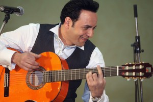 Egyptian singer Moustafa Amar performs during a press conference held to launch his new album "Heya" (She) in Cairo late on May 22, 2010. AFP PHOTO/AMR AHMAD (Photo credit should read AMR AHMAD/AFP via Getty Images)