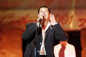 Famous Lebanese singer Ragheb Alama performs late 22 July 2001 in front of some 12 000 people during the 37th Carthage International Festival. (FILM) (Photo by FETHI BELAID / AFP) (Photo by FETHI BELAID/AFP via Getty Images)