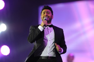 Egyptian pop sensation Tamer Hosny performs on stage in the western Saudi city of Jeddah on March 30, 2018. Thousands of fans were taken by surprise when tickets for Hosny's first-ever Saudi concert came with the edict that dancing was "strictly prohibited". (Photo by Amer HILABI / AFP) (Photo by AMER HILABI/AFP via Getty Images)